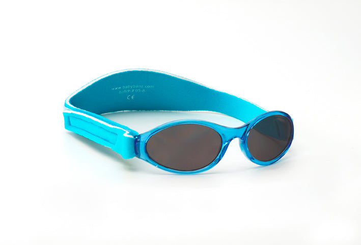 Baby BANZ wrap around sunglasses in Orange Tide with UV protection
